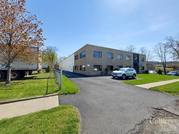 Industrial building in a perfect location to service the Greater Hartford Market: 94 Reed Ave, West Hartford, CT 06110